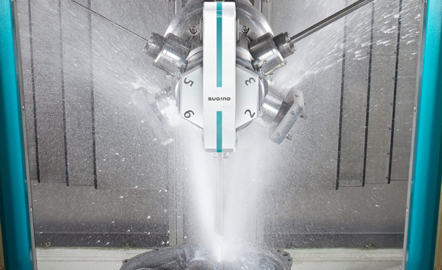 The turret of tools inside the JCC high pressure water jet deburring and parts washing system