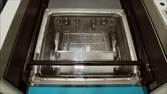 Part drying time can be reduced by 15% to 25% by rotating the workpiece inside a vacuum chamber.